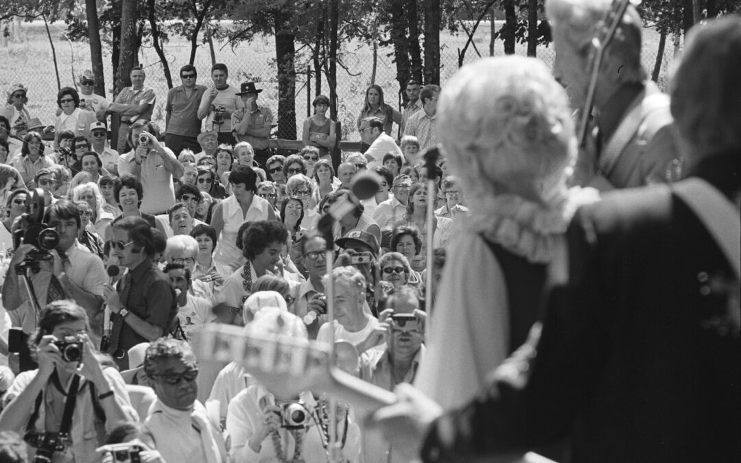 Caption: Paul McCartney (left center rear) and family in crowd listening to Porter Wagoner and Dolly Parton perform at Opryland, Nashville, Tennessee, June 16, 1974. Photo by Les Leverett, courtesy of the Grand Ole Opry Archives.